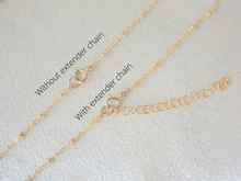 Load image into Gallery viewer, Glimmer Cross Necklace
